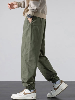 95%polyester,5%spandex Care instructions: Machine wash cold joggers in Black with loose silhouette