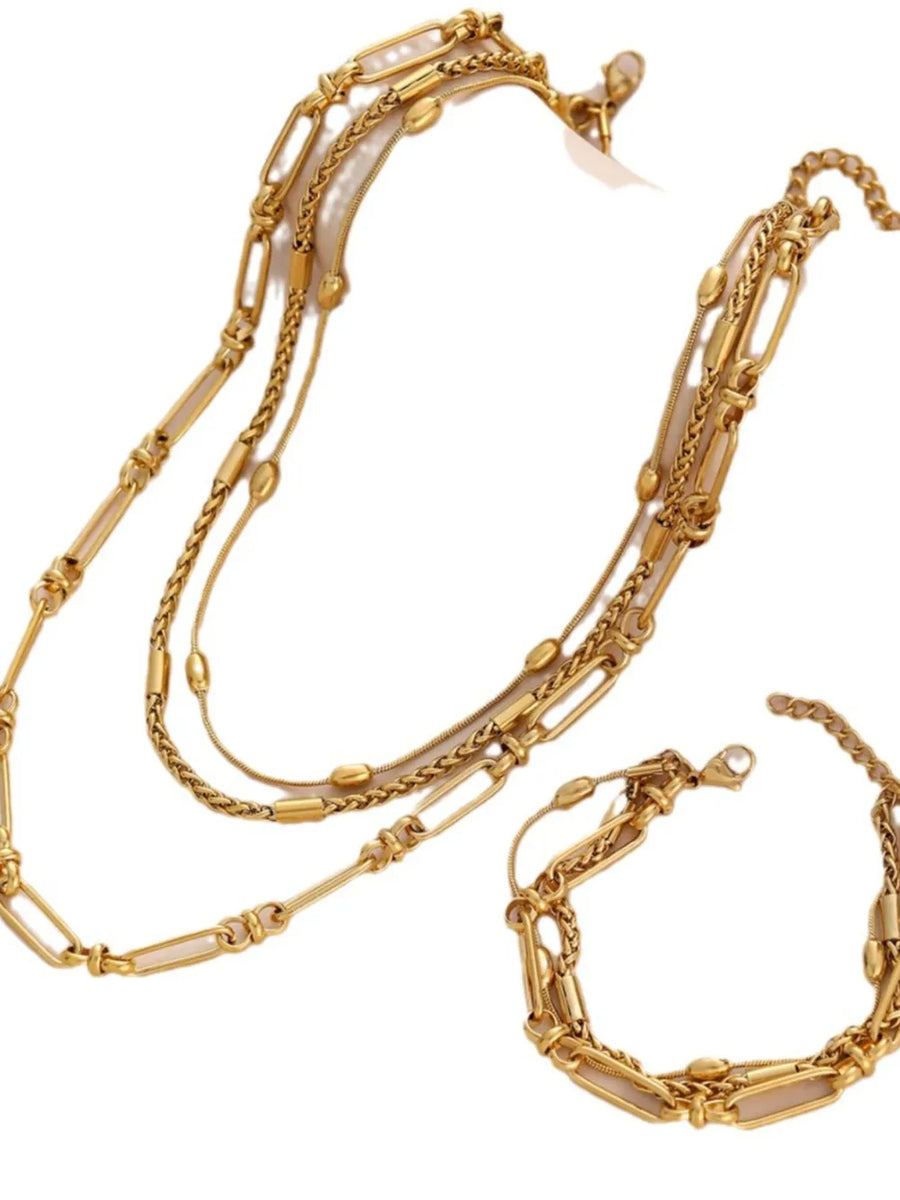 gold jewelry set with short and clasp