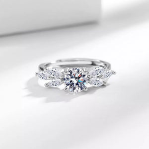 925 sterling silver,Moissanite Carat weight: 1ct Care instructions: While wearin ring in clear with fitted silhouette