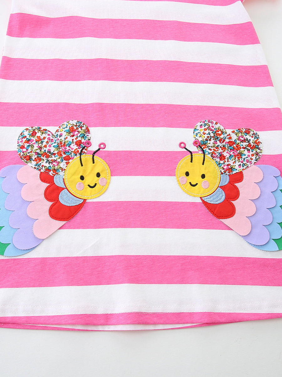 Toddler cotton dress with pink and white stripes and two bee appliqués with floral hearts and rainbow wings.