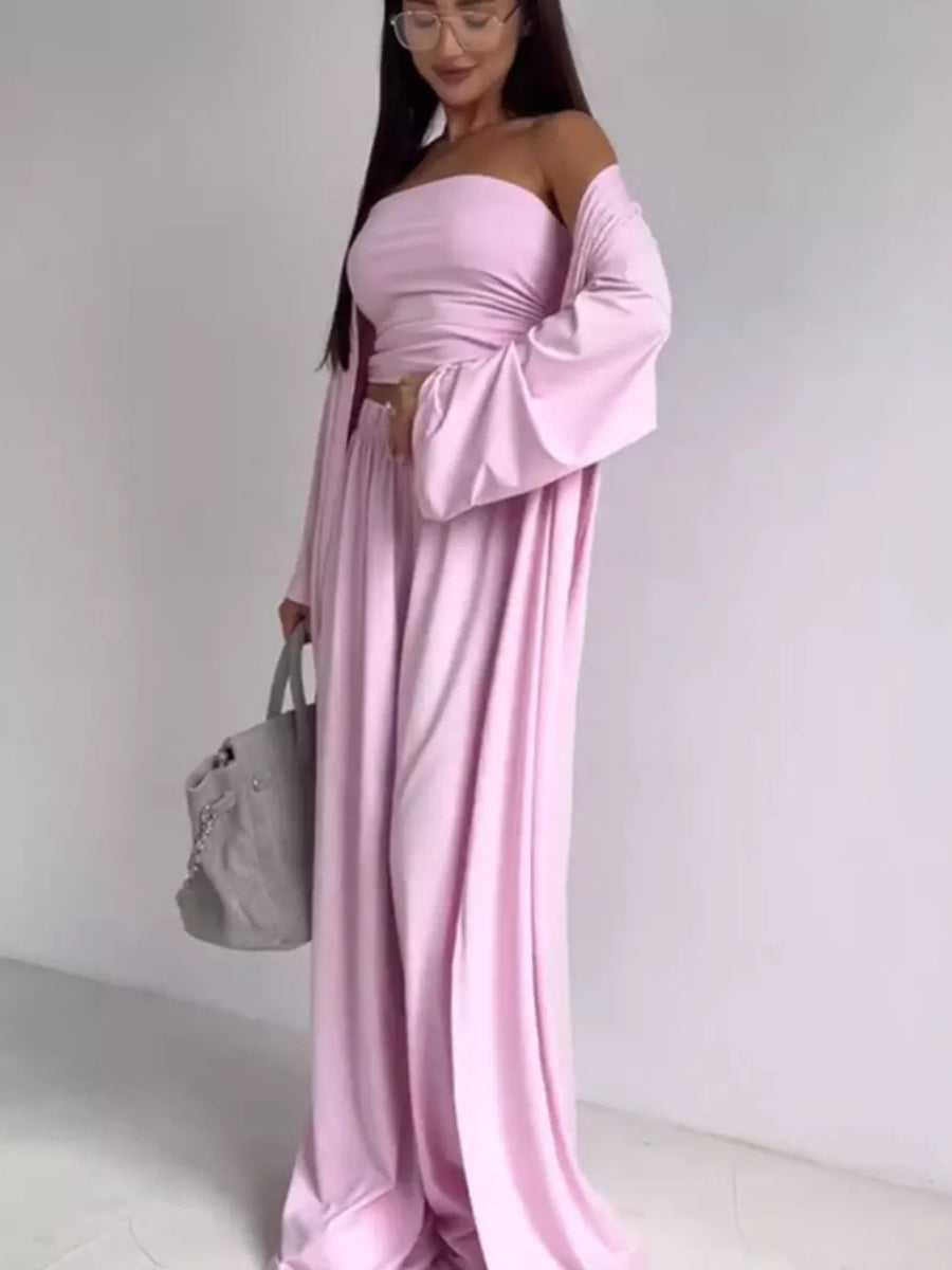 Blush pink three-piece maternity set with crop top, wide-leg pants, and open cardigan.