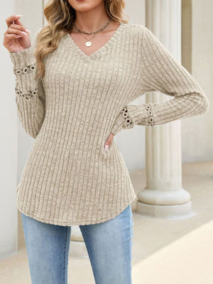 light beige v-neck sweater with striped and v-neck