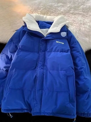 Men's blue quilted puffer jacket with white collar and embroidered logo detail.