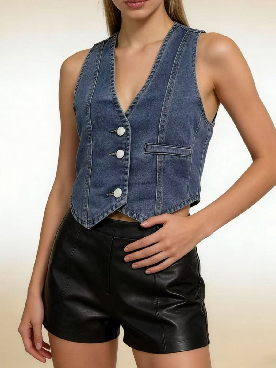 Dark blue denim vest with V-neck, button front, and chest pocket.
