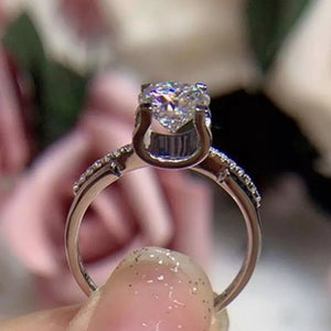 925 sterling silver,Moissanite Carat weight: 2ct Care instructions: Avoid wearin ring in clear with fitted silhouette