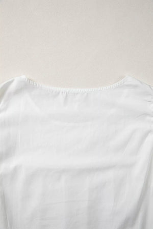 White cotton shirt with lace flutter sleeves and pleated detail
