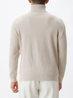 Brown turtleneck sweater featuring ribbed and ribbed