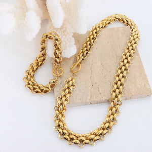 Titanium Steel, 18K Gold-Plated Care instructions: Avoid wearing during exercise jewelry set in Gold with relaxed silhouette