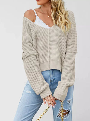Pink pullover sweater with waist-length and pullover
