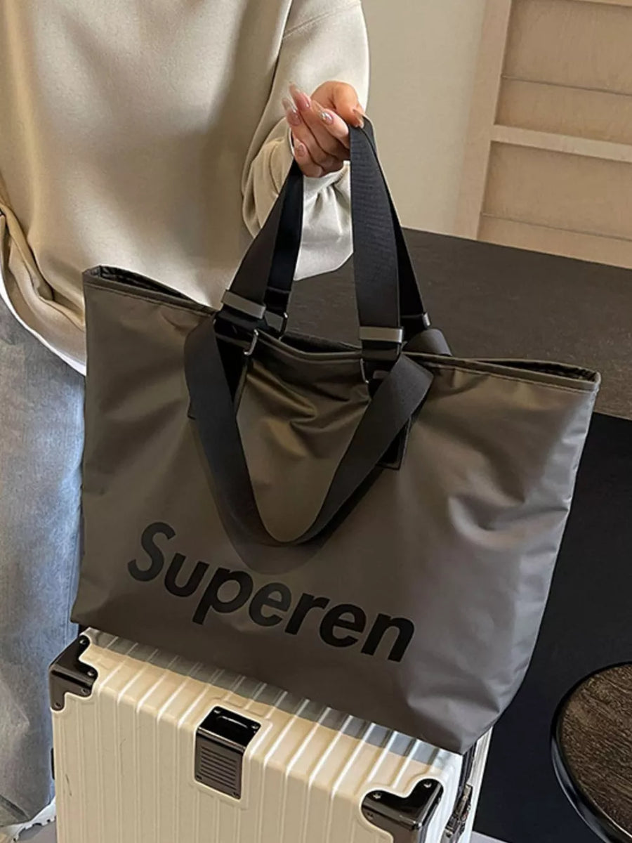 Spacious grey Oxford cloth travel shoulder bag with black straps and "Superen" logo.
