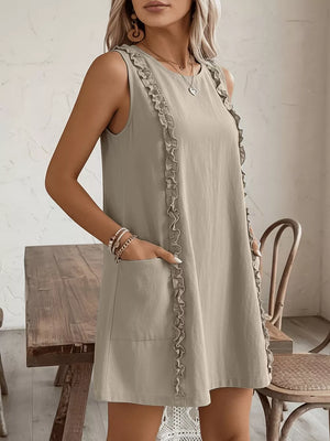 Khaki sleeveless dress with ruffle trim and pockets, crew neck, A-line cut.