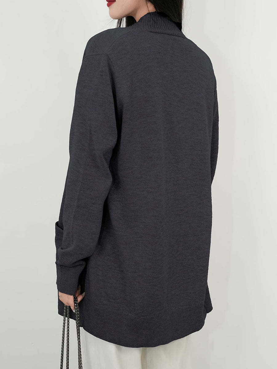 Dark gray textured knit open-front cardigan with pockets and ribbed cuffs.