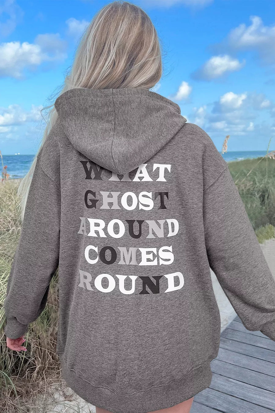white pullover hoodie featuring drawstring and graphic print