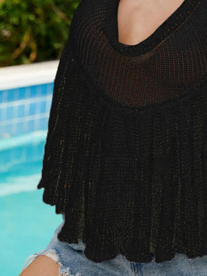 Black knit halter peplum top with a draped neckline and scalloped hem.