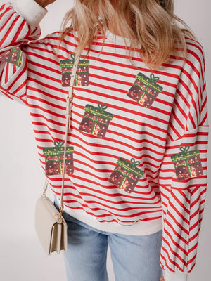 Red and white striped sweatshirt with sequin gift pattern.