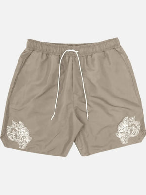 Khaki performance shorts with white embroidered wolf heads on both legs.