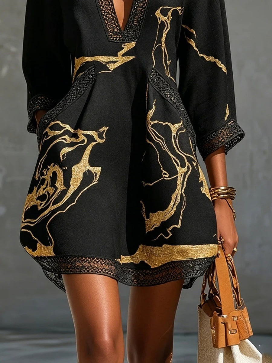 cream mini dress featuring lace detail and abstract-print