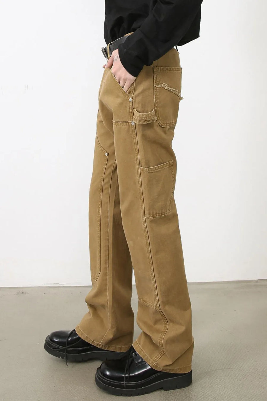 Carpenter-inspired wide leg trousers in camel with distressed pocket detail.