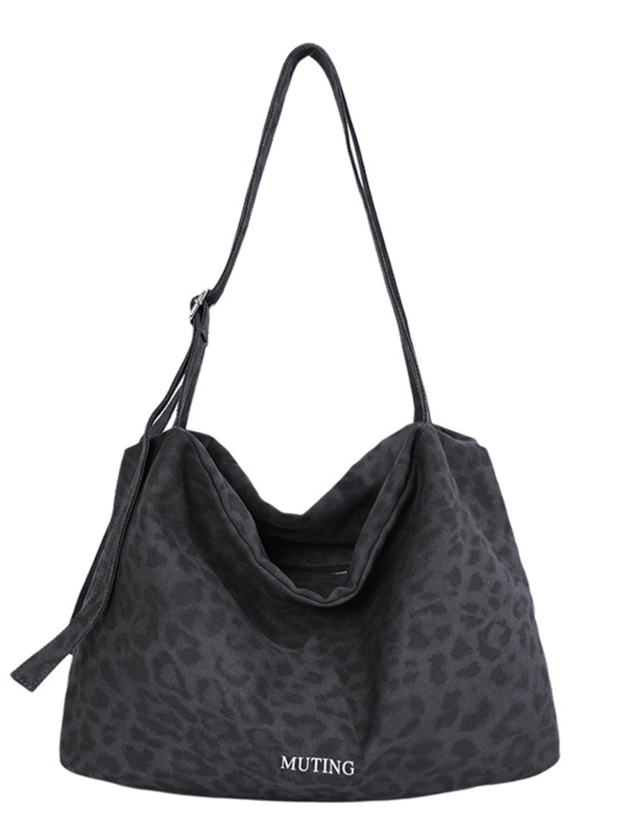 tote featuring leopard in beige with Polyester Imported Size & texture