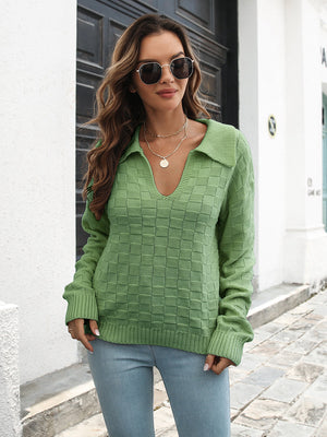 Matcha green acrylic knit sweater with a textured checkered pattern and polo neckline.