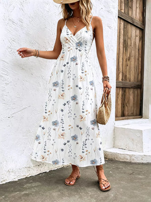 White floral print spaghetti strap midi dress with adjustable straps and a-line cut