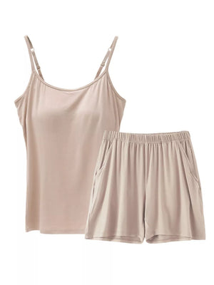 Bean powder cami and shorts pajama set with adjustable straps and pockets.