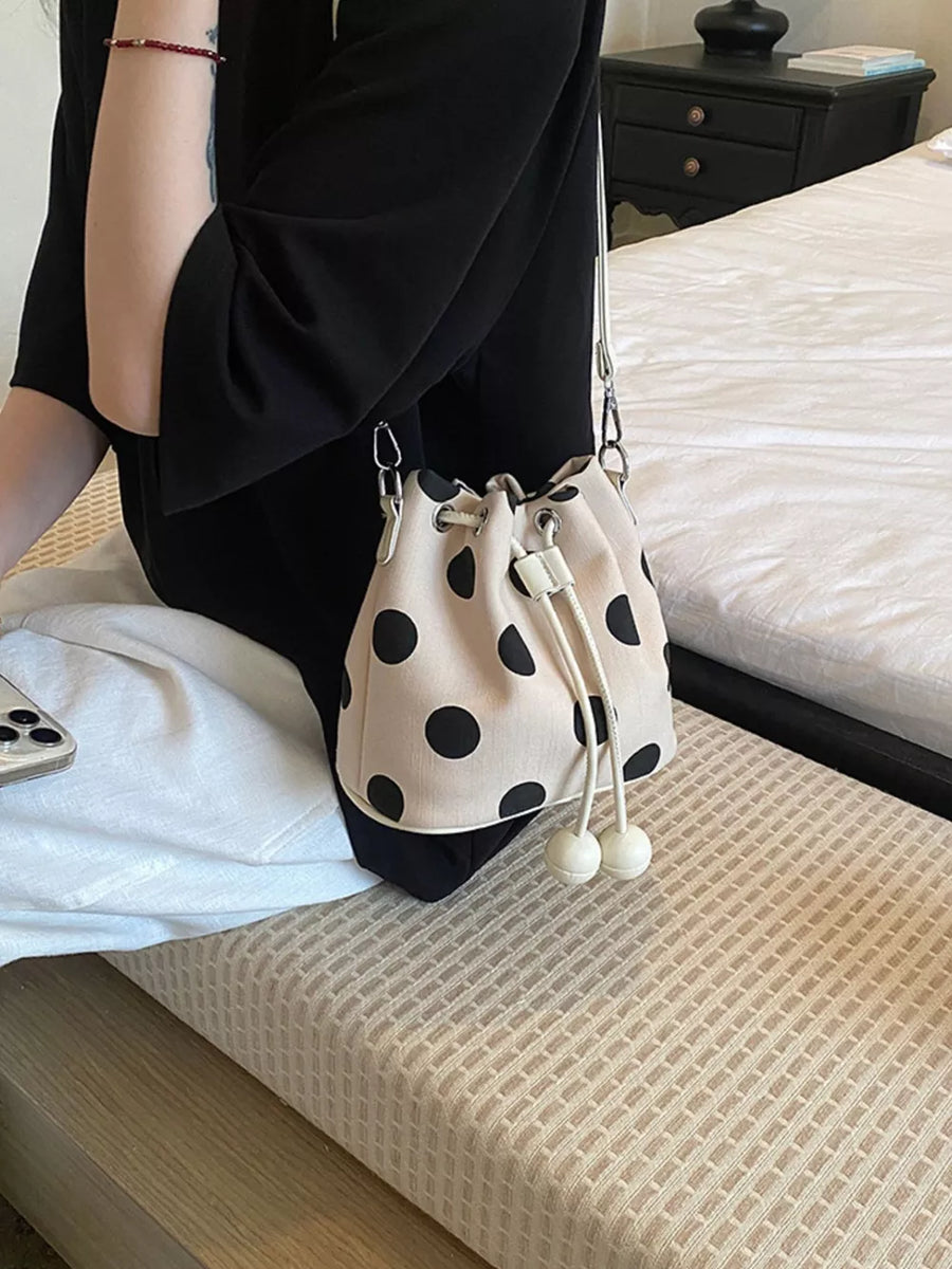 crossbody bag featuring polka dot in White with PU Leather Imported Size & texture
