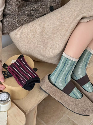 socks in sage green with striped and mid-calf length