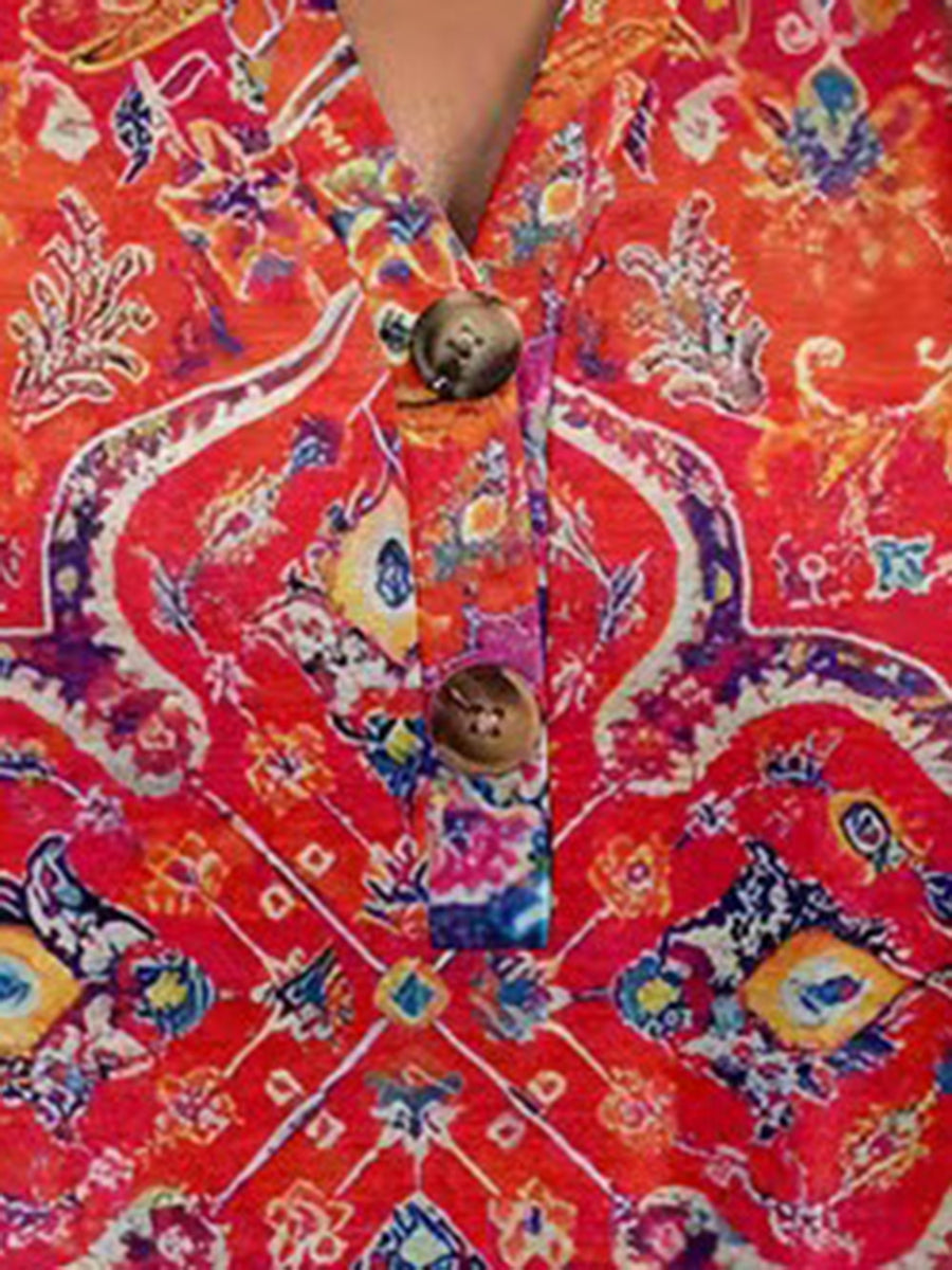 Americana Henley top in Orange-Red with a vibrant paisley print and button detail.