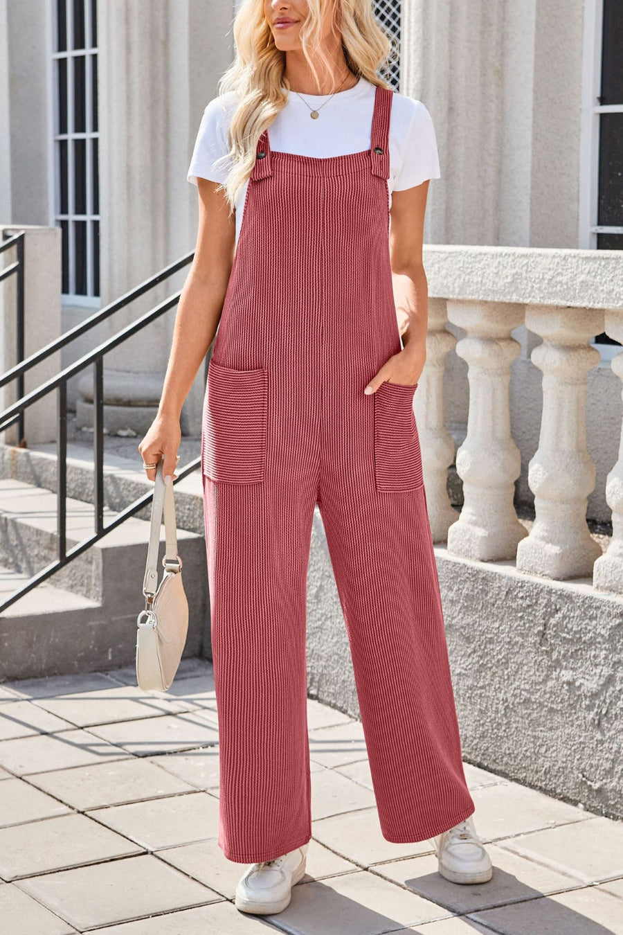 Striped denim overalls in Strawberry with patch pockets and wide legs.