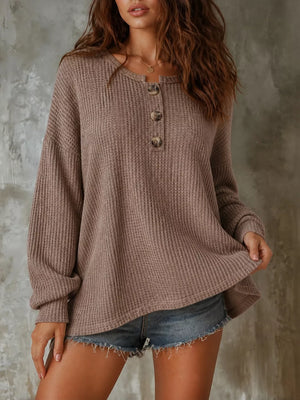 100% polyester Care instructions: Machine wash cold henley in Black with relaxed silhouette