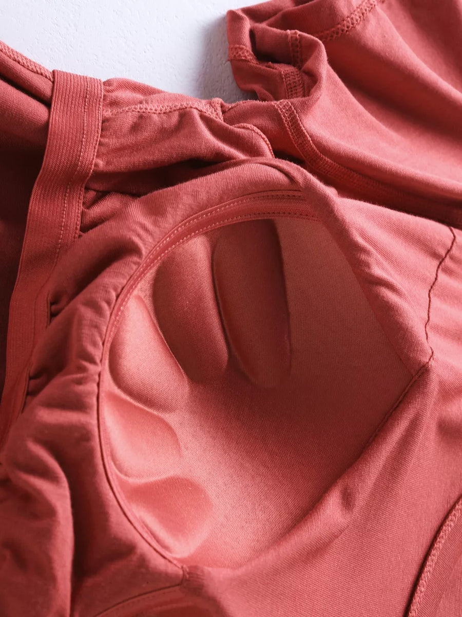 Pajama set detail showing built-in padded cups in Windsor Red.
