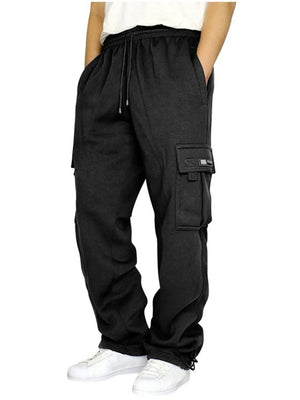 Black fleece cargo lounge trousers with drawstring waist and side pockets.