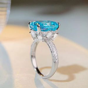 925 sterling silver, Zircon Care instructions: Avoid wearing during exercise, as ring in Pastel Blue with fitted silhouette