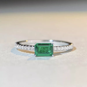 silver ring featuring zircon stone and geometric
