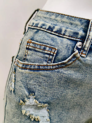 95% polyester, 5% elastane Care instructions: Machine wash cold denim shorts in medium blue with regular silhouette