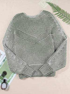 Relaxed ribbed knit boat neck sweater in stripe with a V-shaped yoke detail.