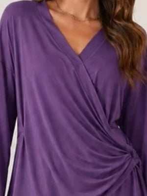 100% polyester Care instructions: Machine wash cold wrap top in Purple with relaxed silhouette