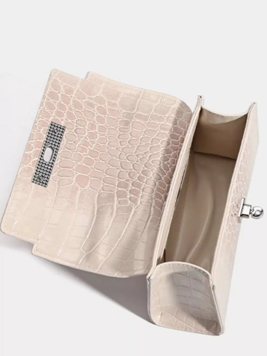 Off-white croc-embossed small tote bag with silver hardware detail.