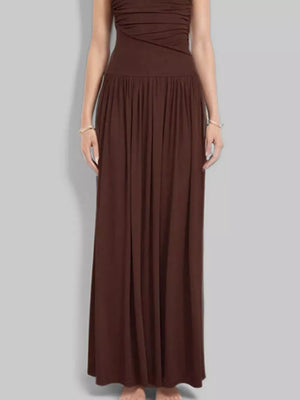 Brown ruched maxi dress with gathered neckline and flowing skirt