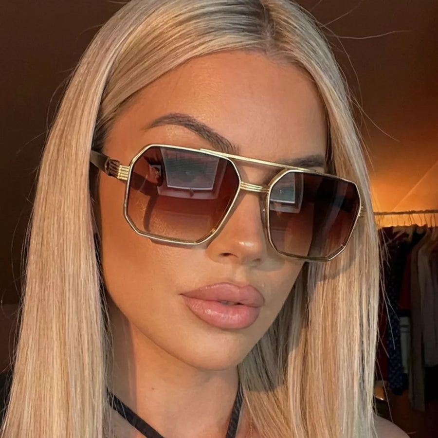 dark gray sunglasses featuring UV protection and geometric