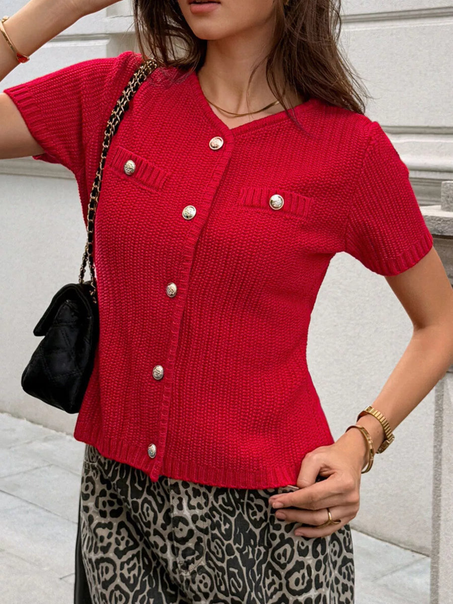 Red buttoned short-sleeve cardigan with decorative pockets and gold buttons.