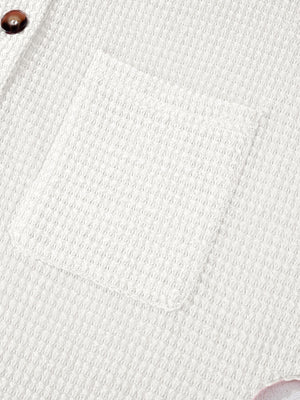 White waffle knit button-up shirt with chest pocket detail