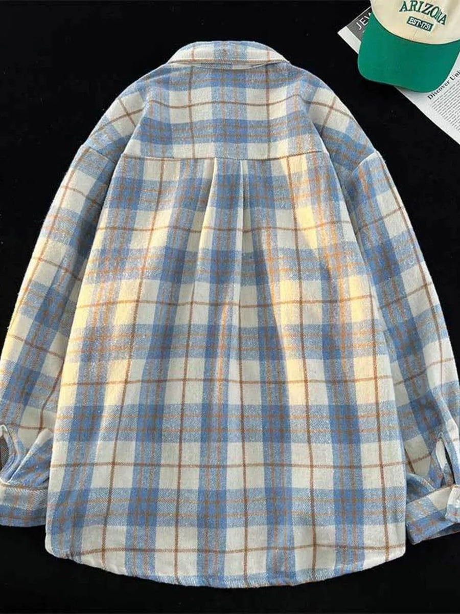 Blue button-up shirt with hip-length and button-front