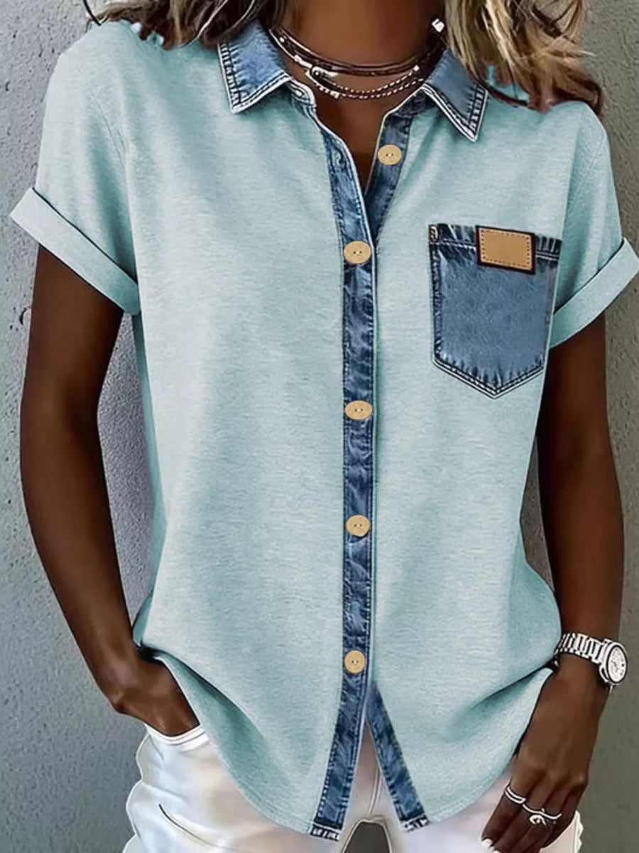 Heathered short sleeve shirt in Lake Blue with denim accents, button front, and chest pocket.