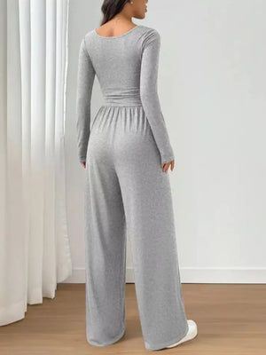 100% polyester Care instructions: Machine wash cold jumpsuit in Gray with wide-leg silhouette