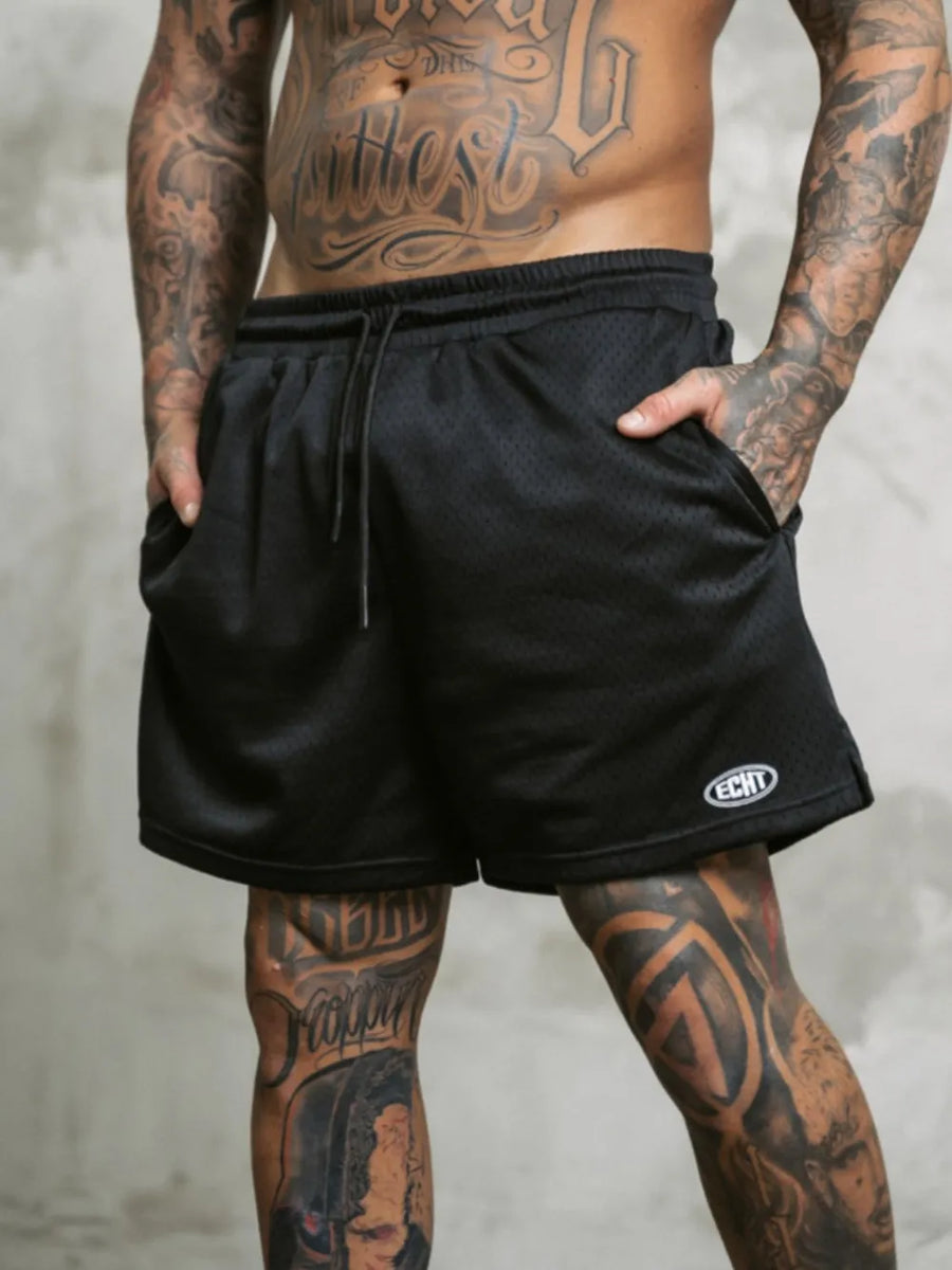 Black perforated performance shorts with drawstring and logo detail