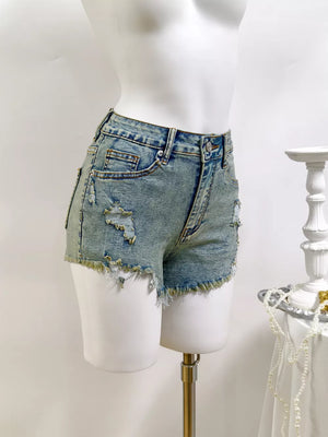 light blue denim shorts with mini and zip-front