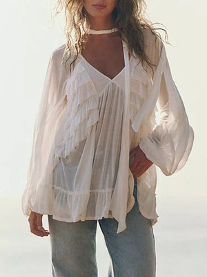 White sheer ruffle trim beach cover-up with v-neck and bell sleeves.