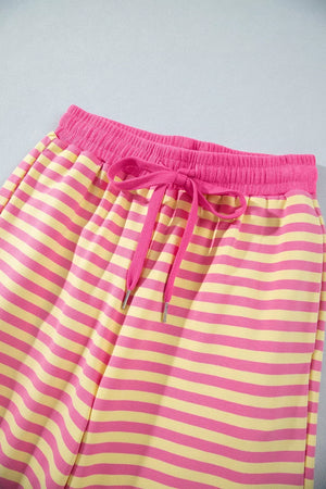pale yellow pajama set featuring drawstring and striped